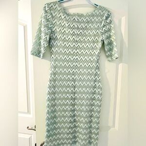 Classy mint green geometric style dress with gold thread accents. Shiny & Classy